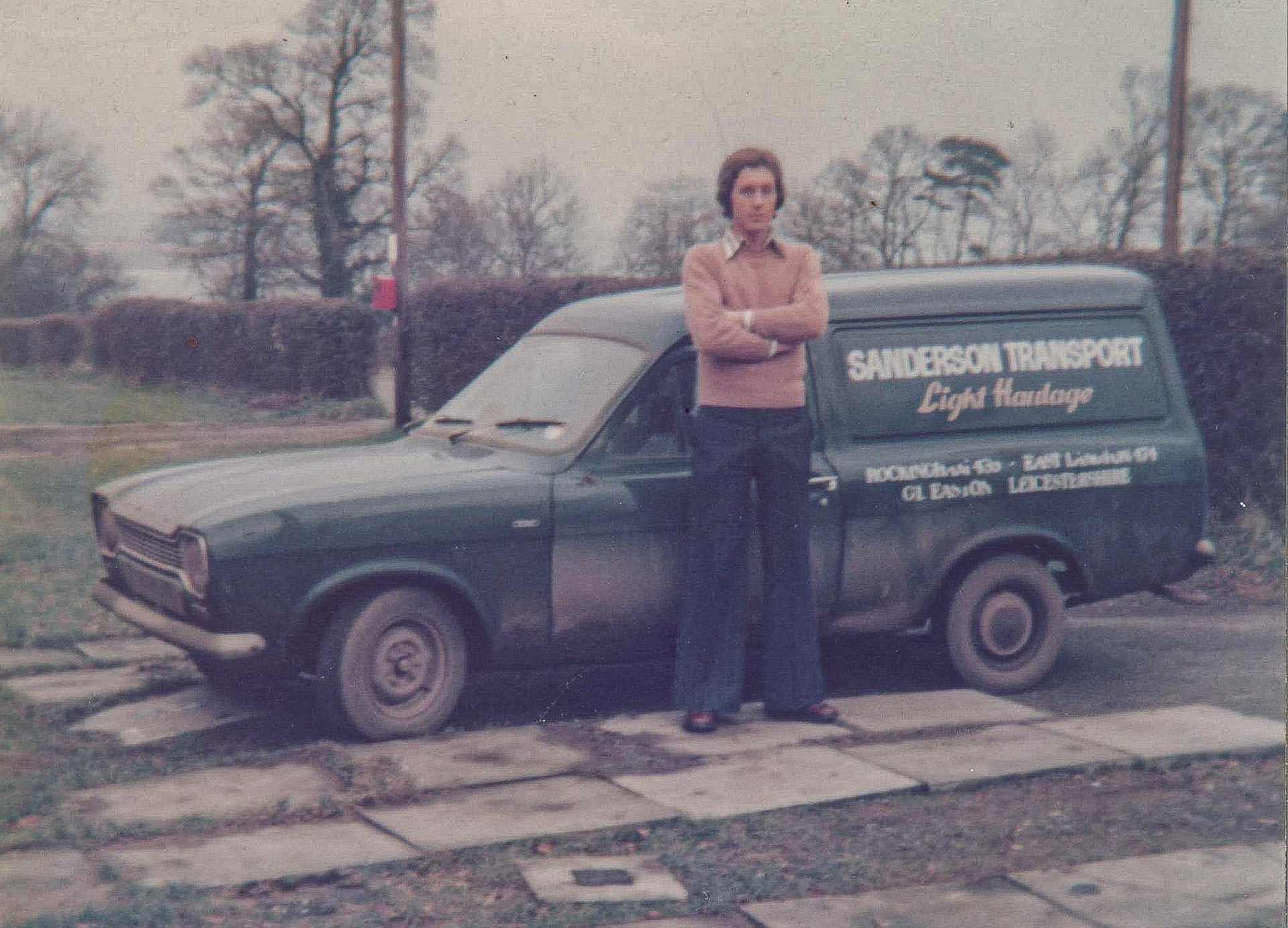 Stephen Sanderson standing by a van - vintage